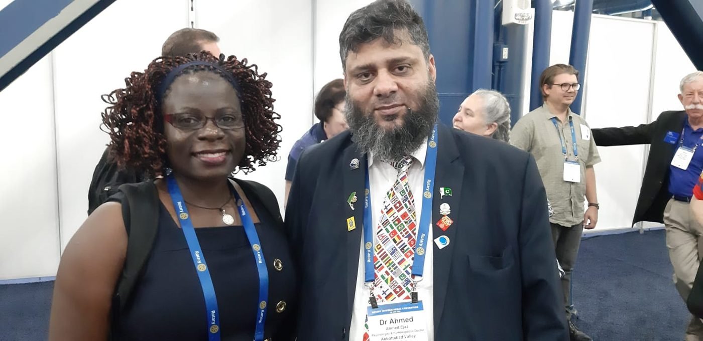 Dr. Ahmed Ejaz with a fellow Rotarian at the Houston convention