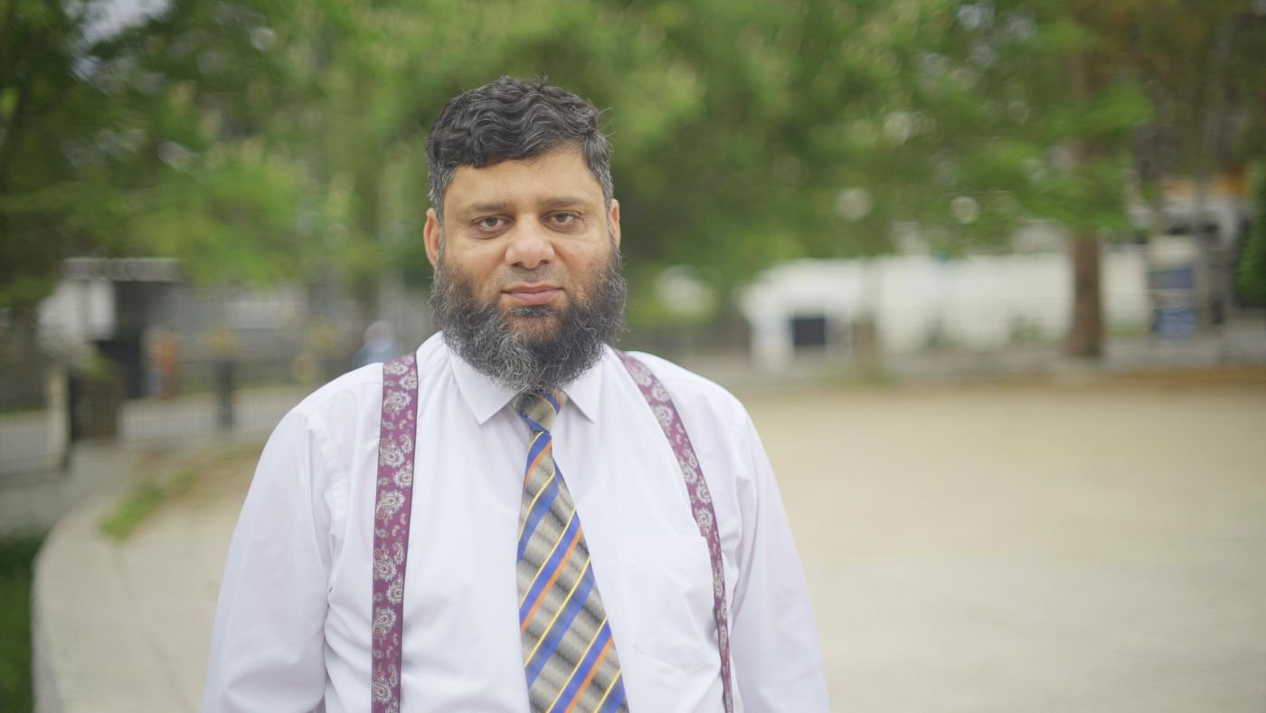 Dr. Ahmed Ejaz outdoors under trees